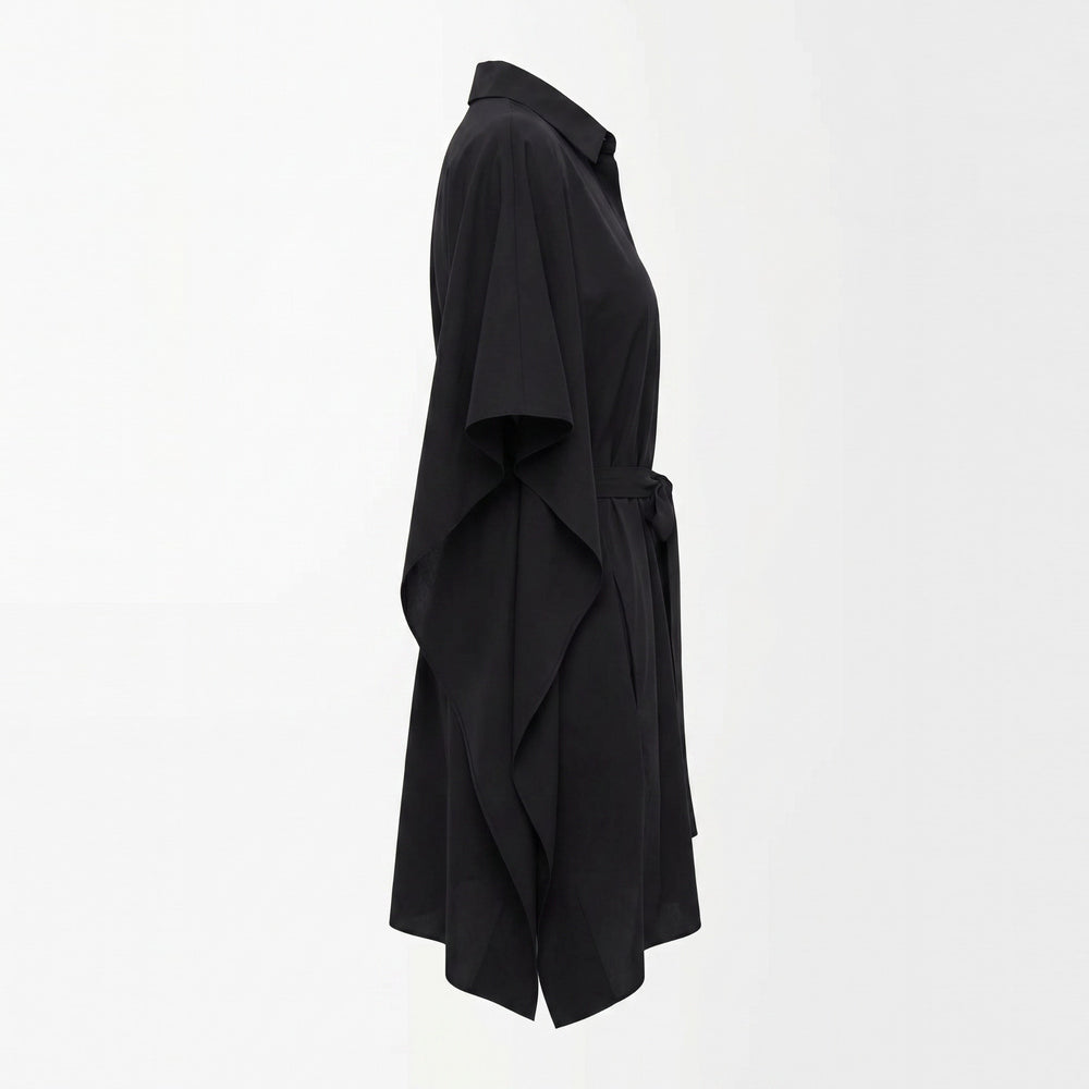 Shop online from our exclusive website and discover the Organic Cotton Kaftan Dress in Black by Benedetti Life, crafted from premium organic cotton for breathable comfort and timeless versatile elegance.