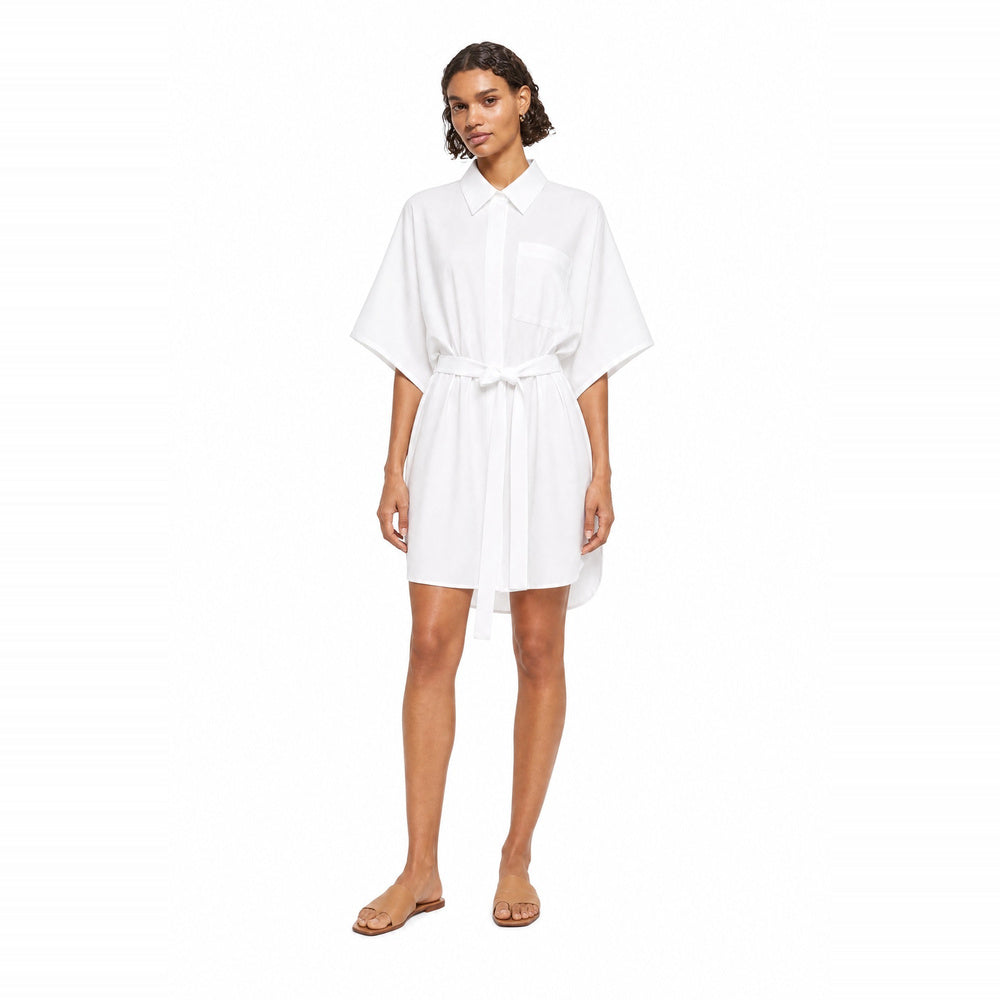 Shop online from our exclusive website and discover the Organic Cotton Kaftan Shirt Dress in White by Benedetti Life, crafted from premium organic cotton for breathable comfort and timeless minimalist elegance.
