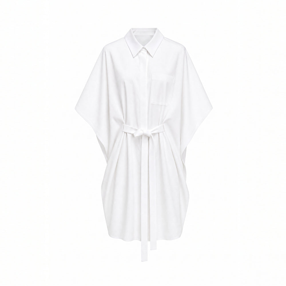 Shop online from our exclusive website and discover the Organic Cotton Kaftan Shirt Dress in White by Benedetti Life, crafted from premium organic cotton for breathable comfort and timeless minimalist elegance.