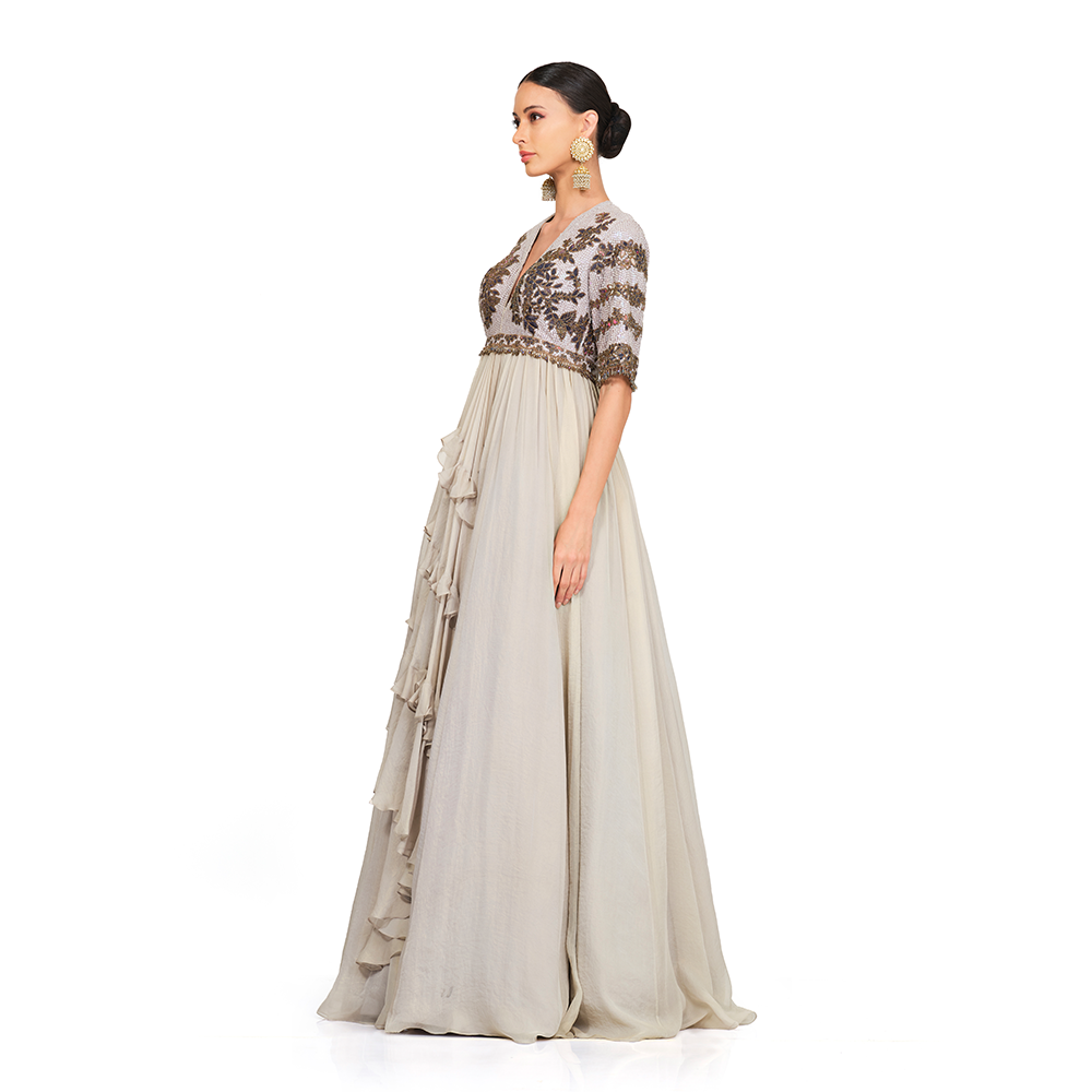 Sequin and Printed Patch Work Embroidery l Keyhole back l V neck l Centre back zip closure l Ruffle Detailing on the bottom.