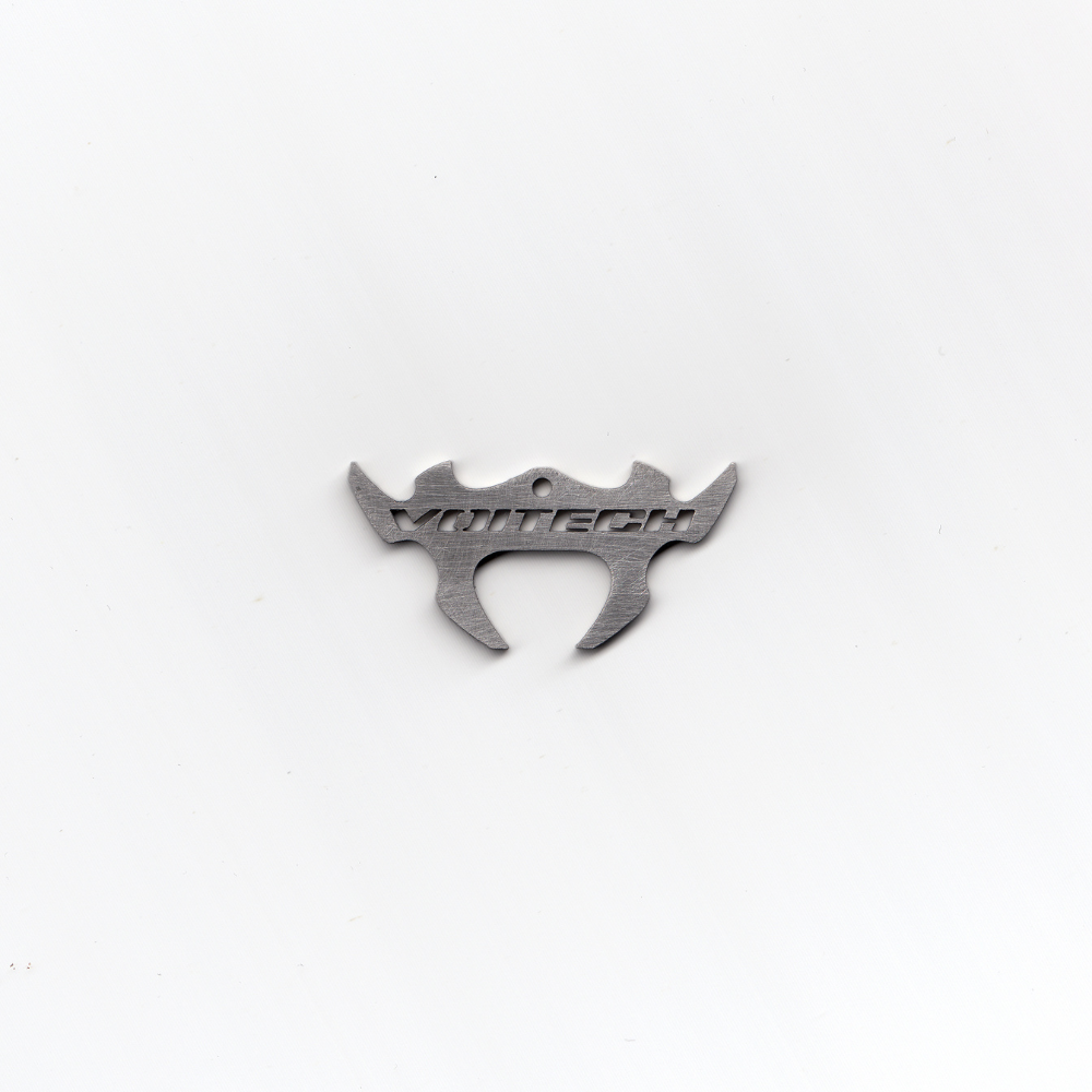 Shop online from our exclusive website and discover the Parallax Tag by Voitech®, featuring brushed stainless steel, precision-cut geometry, and an industrial motorsport-inspired design.