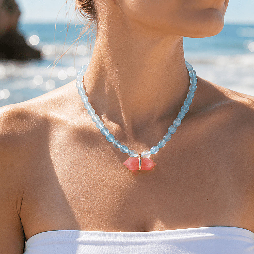 Discover the Pele Watermelon Quartz Beaded Necklace at The Luxe Maison, featuring vibrant watermelon quartz and luminous jade beads for a striking blend of passion, balance, and natural elegance.