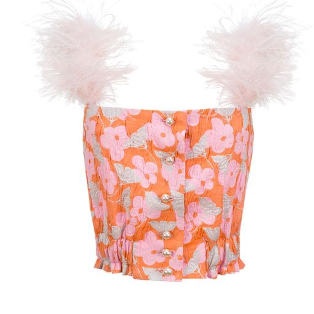 Pink flower top with feather details is designed with pearl bottoms on the front and detachable feather details.
