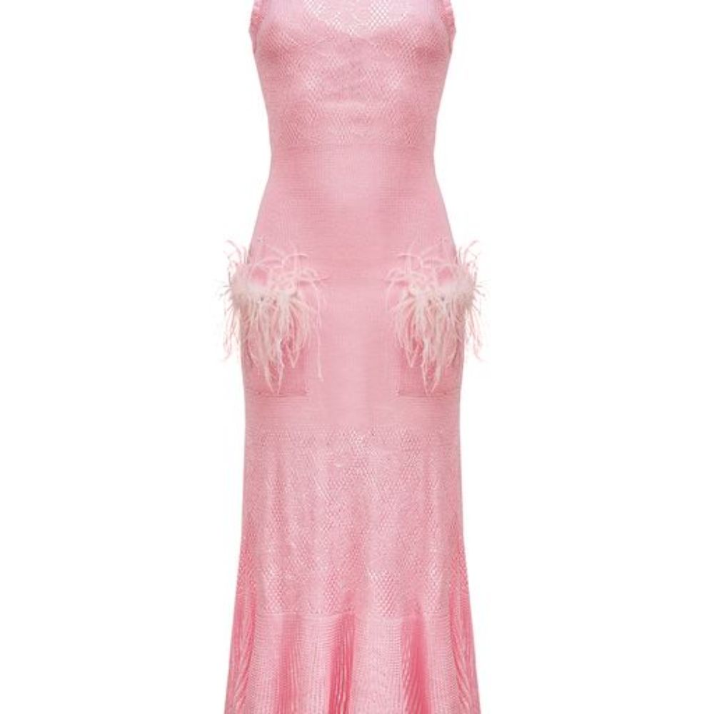 Pink knit dress is designed with a round neck and feathers on the pockets. 