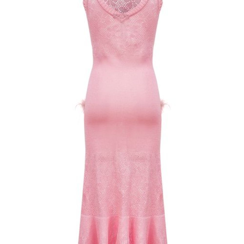 Pink knit dress is designed with a round neck and feathers on the pockets. 