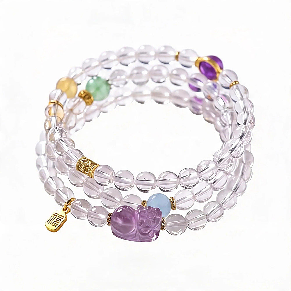 Discover the Pixiu Clear Quartz, Amethyst & Aquamarine Wrap Bracelet at The Luxe Maison, featuring natural crystals and a symbolic blessing charm.