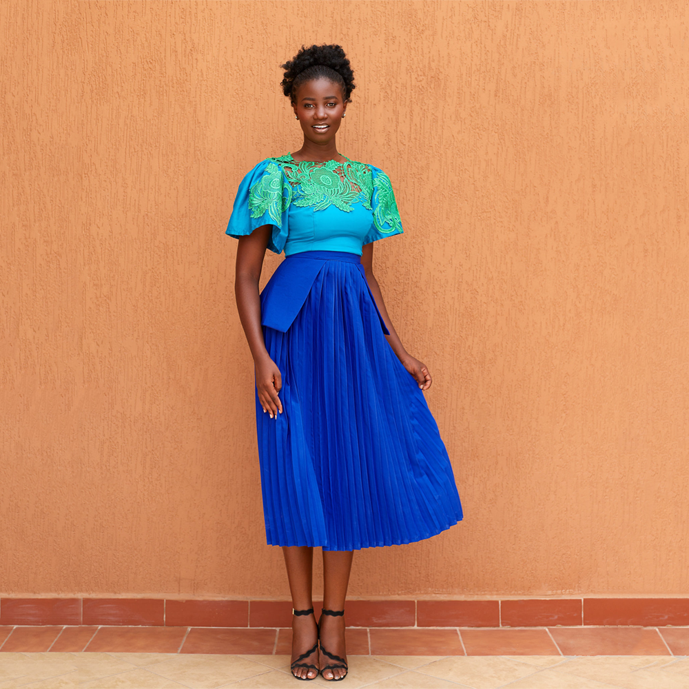 Pleated Midi Skirt: Timeless sophistication meets modern flair. Effortless style with feminine grace.