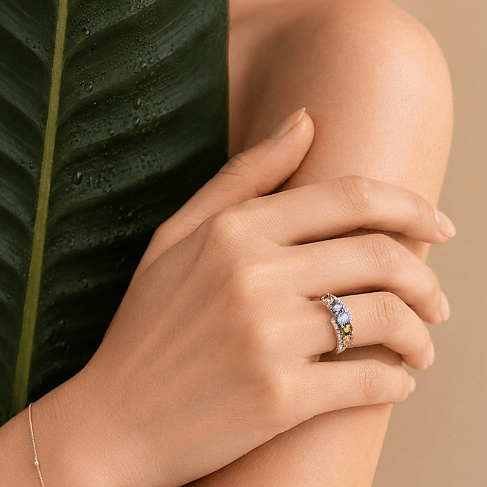 Discover the Pocket Rainbow Tourmaline Gemstone Ring at The Luxe Maison, featuring vibrant pink, lavender, blue, green, and golden tourmaline stones accented with sparkling zircon details. Crafted in 18K white gold vermeil over S925 sterling silver, this adjustable ring brings a colorful, joyful touch to everyday style with its elegant rainbow-inspired design.