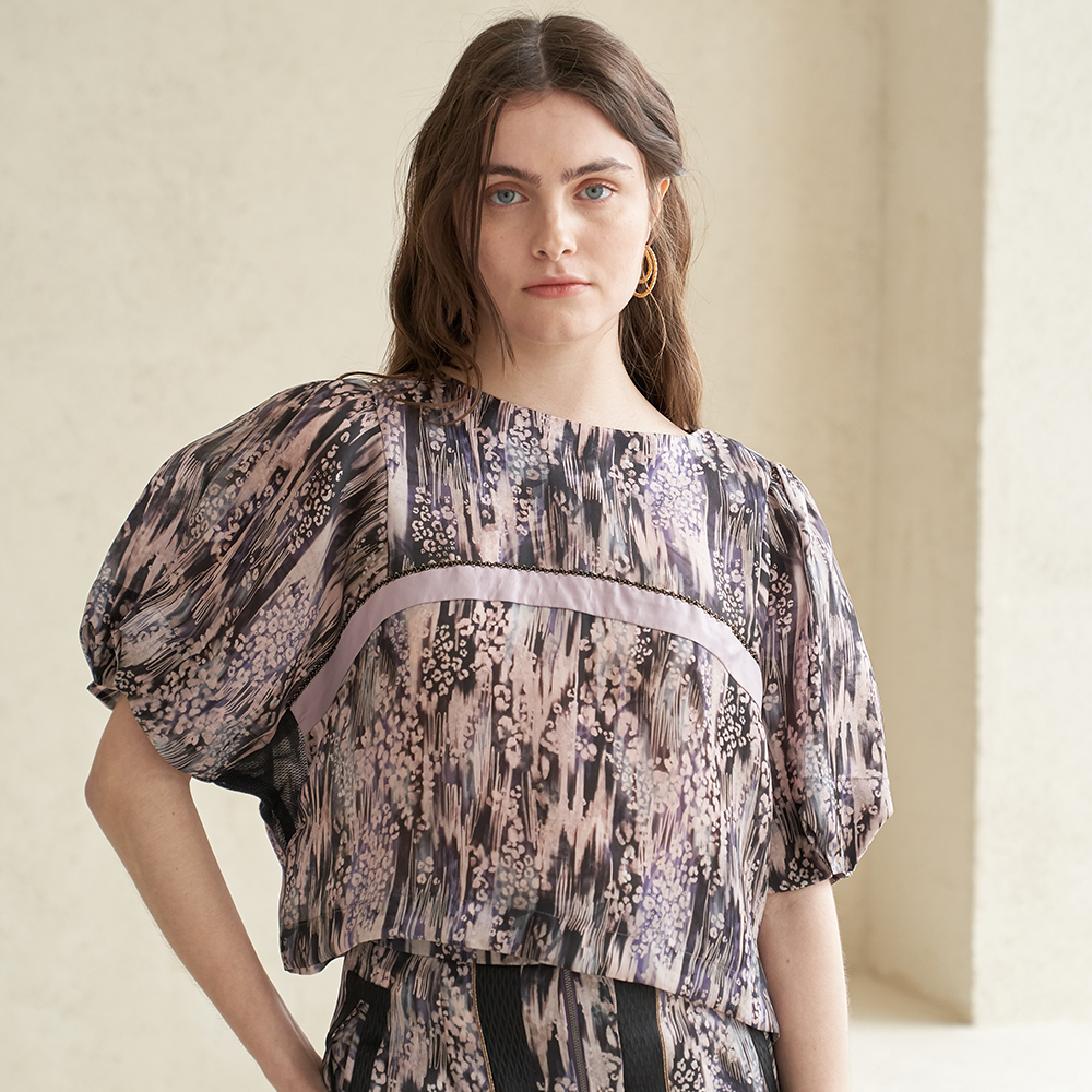 Stylish leopard pattern silk blouse in women's clothing. Shop now!