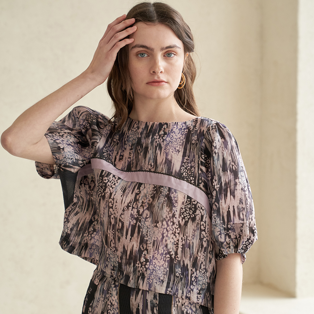 Stylish leopard pattern silk blouse in women's clothing. Shop now!