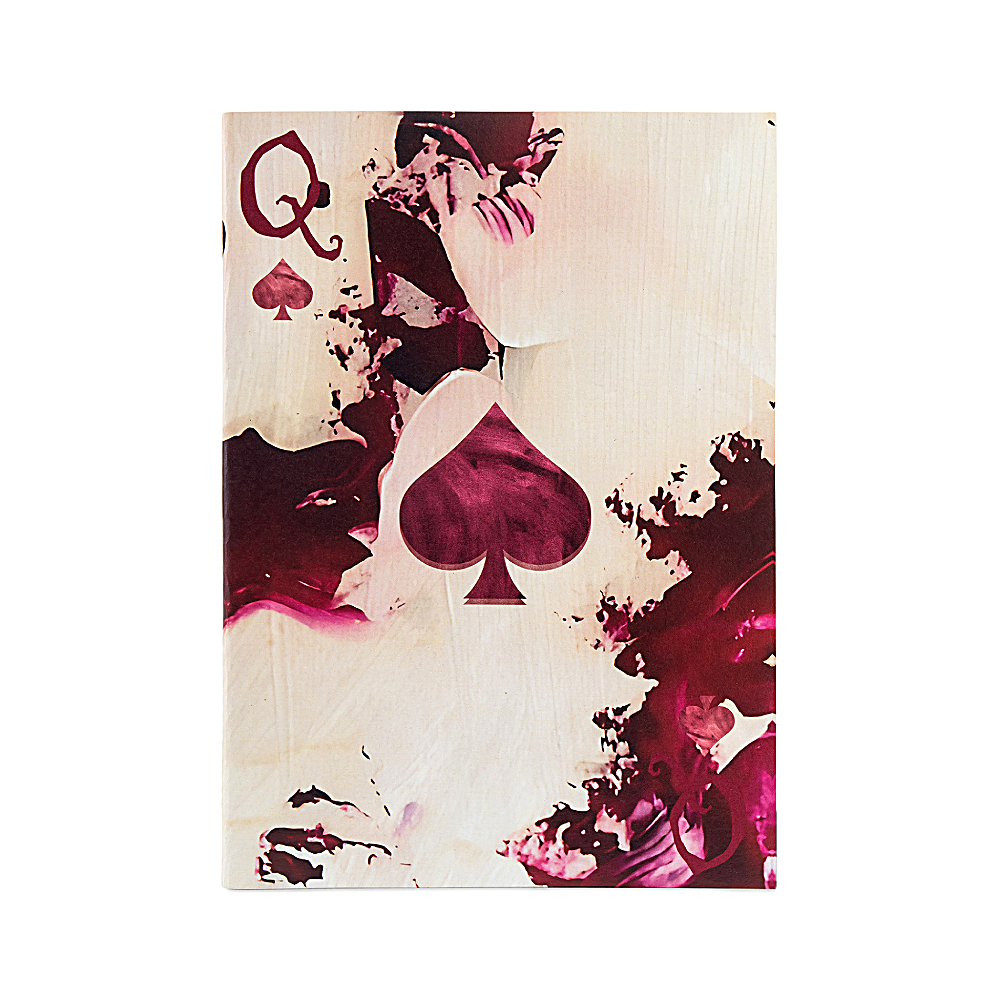 Discover the Queen of Spades Notebook at The Luxe Maison, featuring pink and ivory folds, a translucent vellum cover, and personalized rhyme options. Made in Dubai.