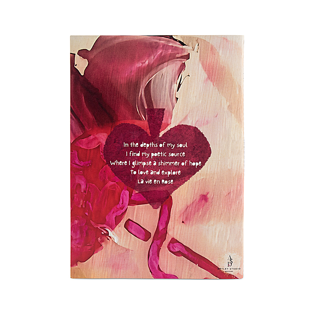 Discover the Queen of Spades Notebook at The Luxe Maison, featuring pink and ivory folds, a translucent vellum cover, and personalized rhyme options. Made in Dubai.