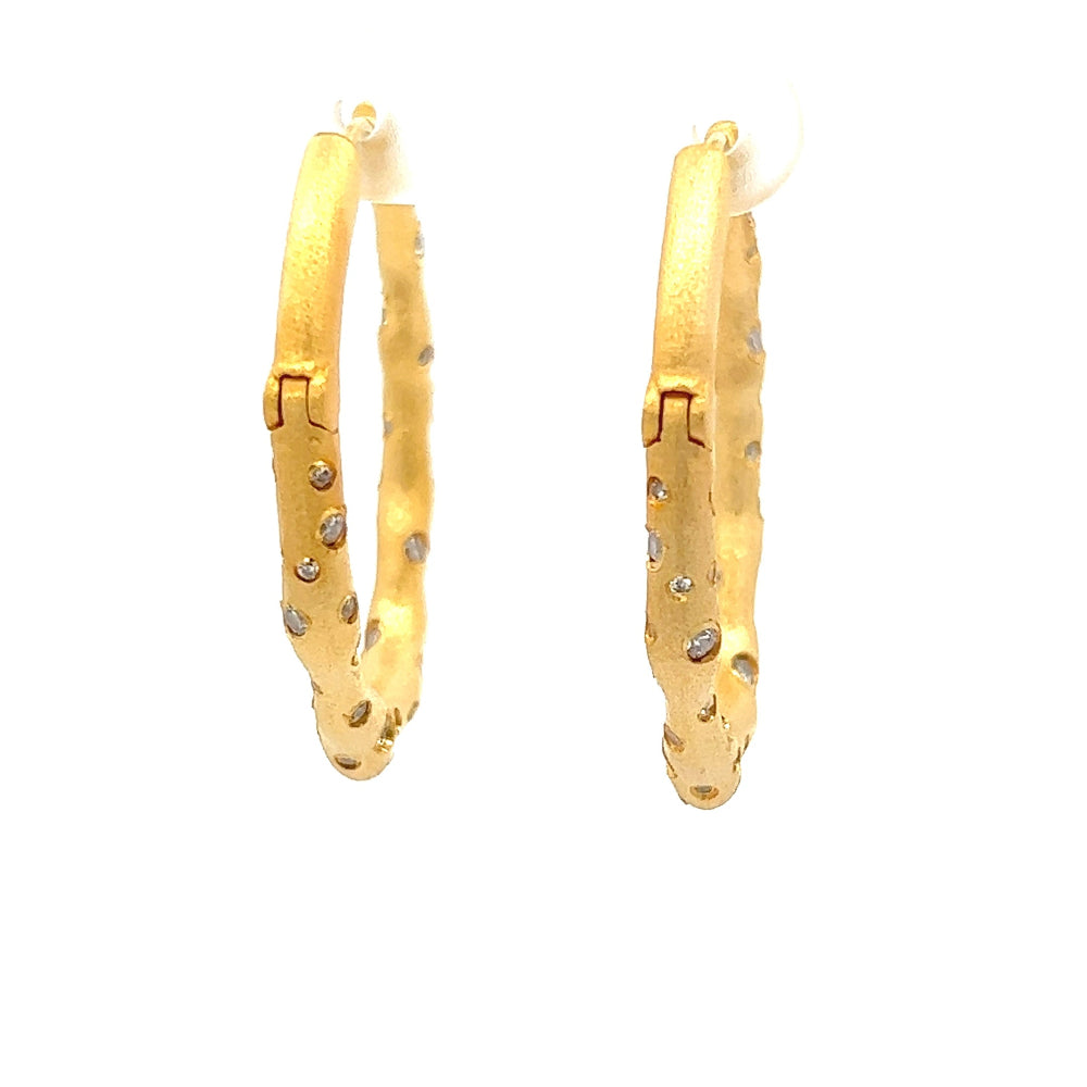Shop online premium 18K gold medium hoop earrings with sparkling cubic zirconia stones.