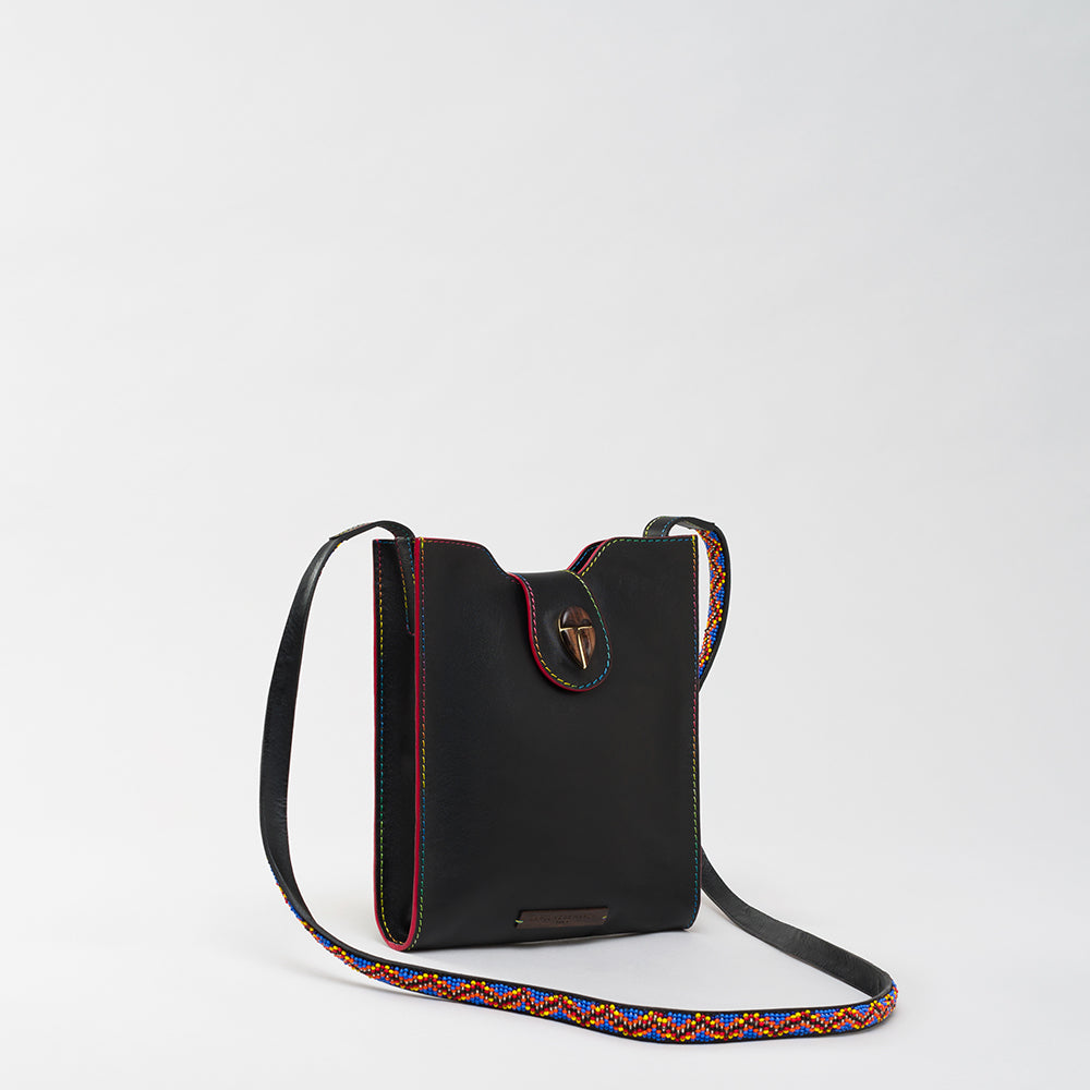 Indulge in shopping luxury with The Luxe Maison’s Raph Abeba Black/Multi handbag. Elevate your style effortlessly. Shop Now!