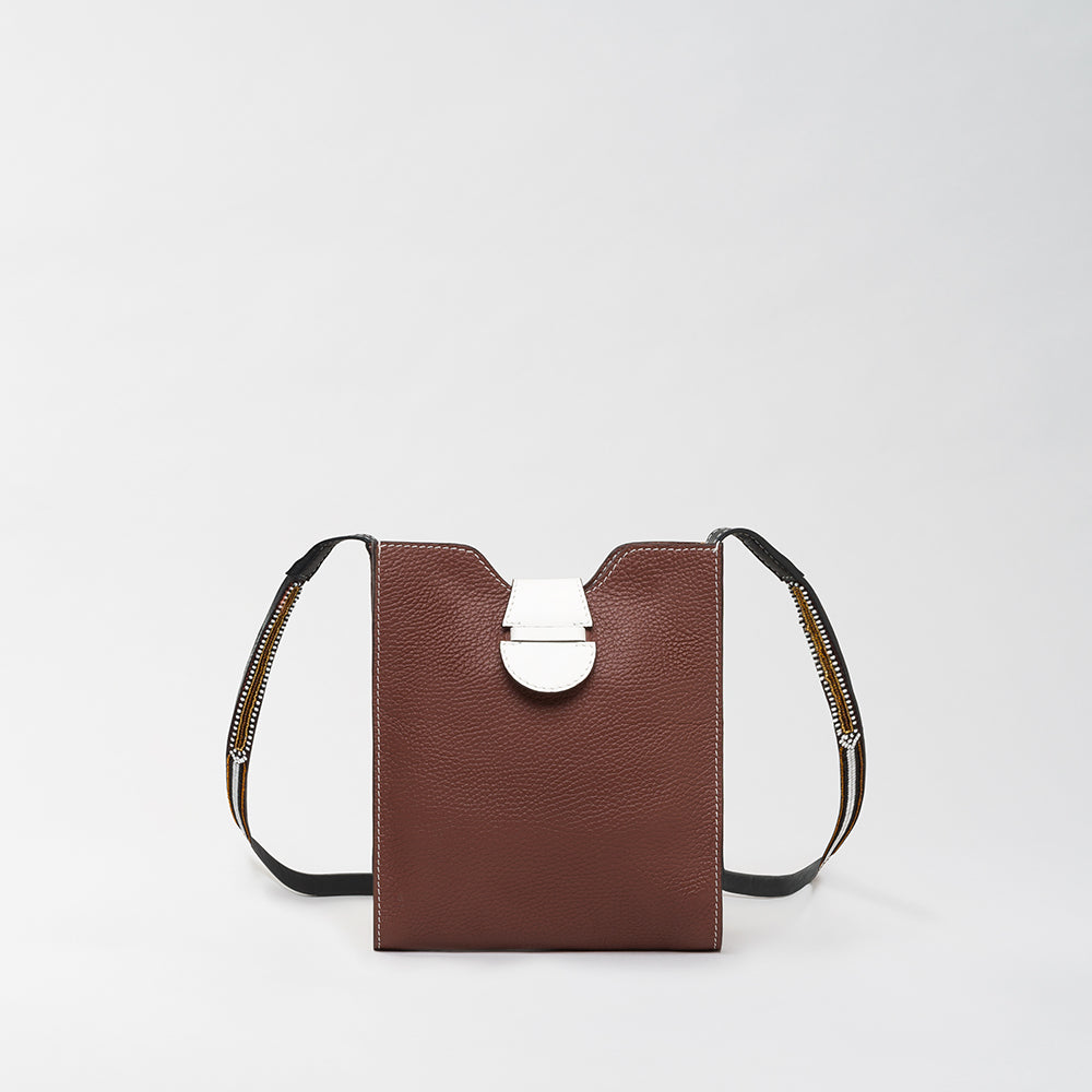 Experience The Luxe Maison's Raph Nala Brown, crafted for luxe accessory lovers online. This timeless piece adds elegance to your wardrobe. Shop Now!