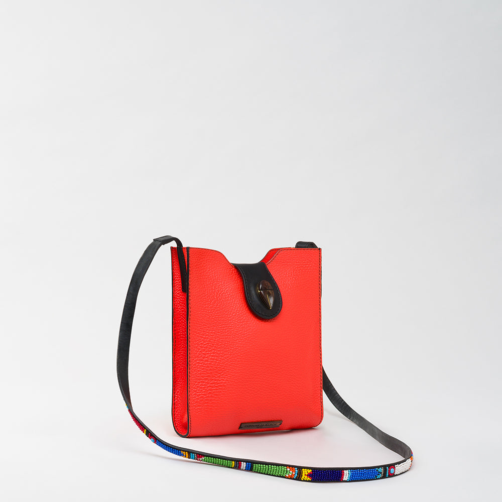 Unveil your style with the Raph Uhuru Coral designer women's handbag by The Luxe Maison. Embrace elegance and sophistication. Shop Now!