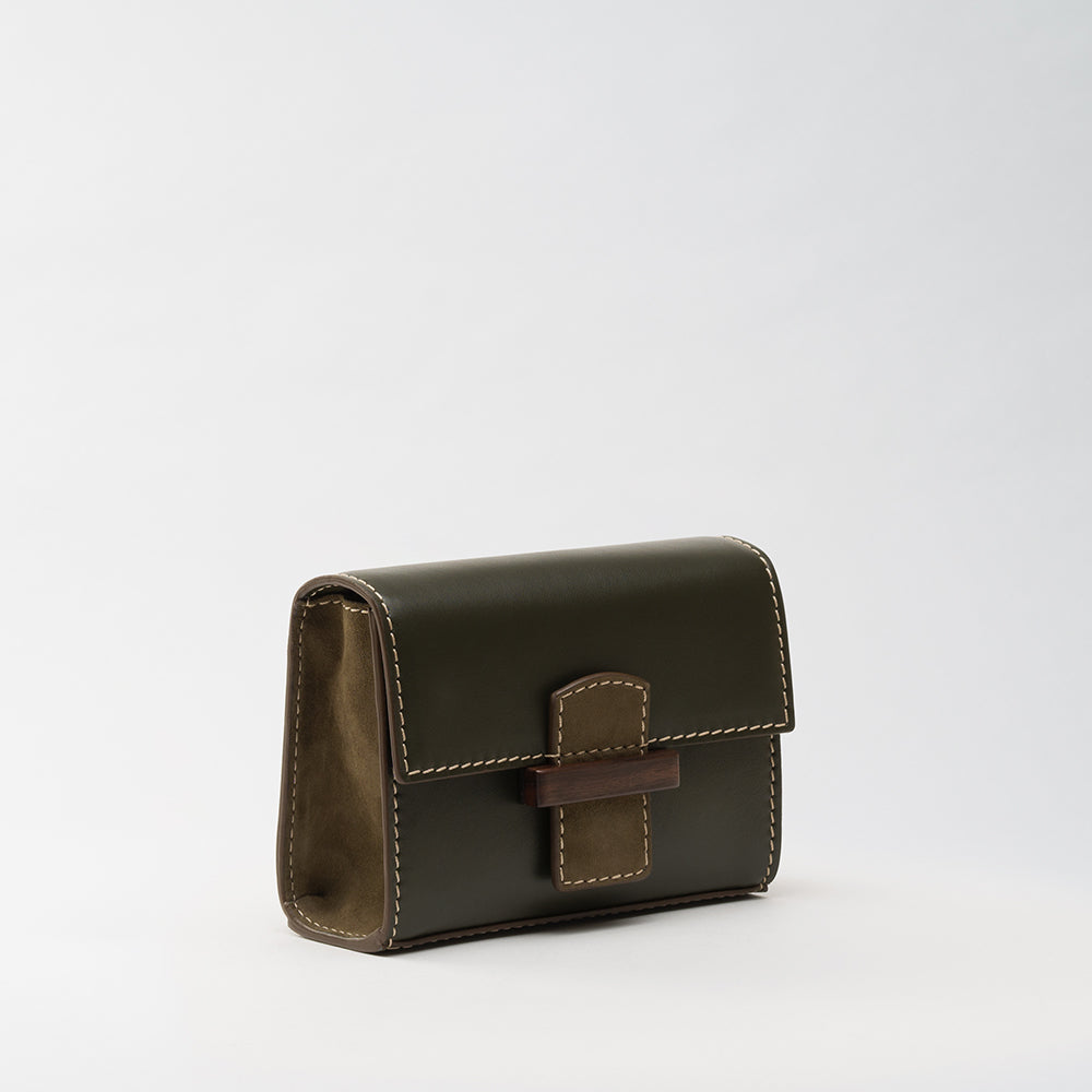 Explore the Reka Huldra Mini Green handbag, a chic and compact choice on your go-to shopping website. Perfect for any occasion. Shop Now!