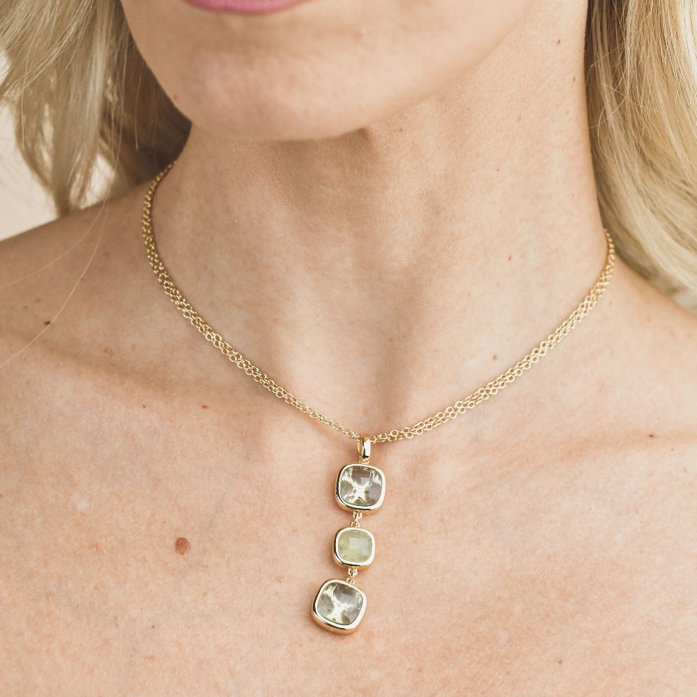 Shop online premium gold plated necklace with green and light green amethyst crystal pendant design.