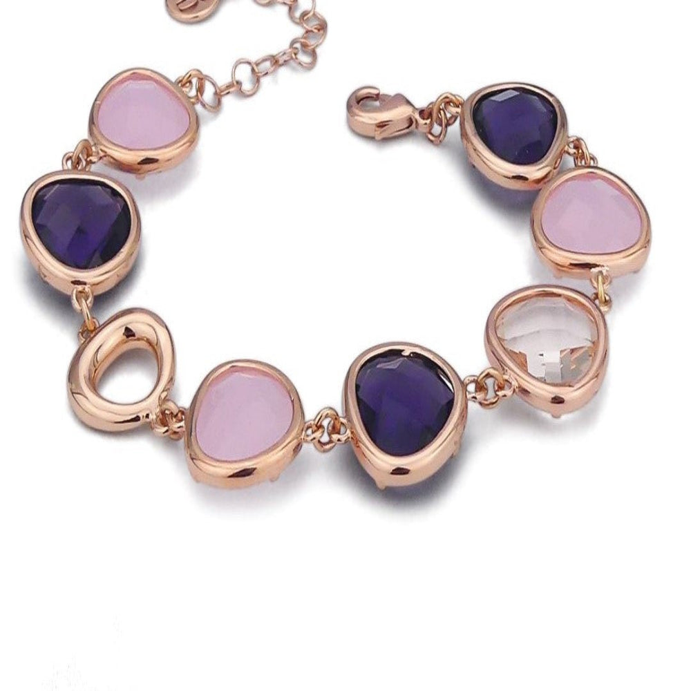 Rose gold plated bronze bracelet with irregular metallic elements and peach, violet, and rose quartz briolette-cut crystals for a soft contemporary look. Shop premium jewelry online.
