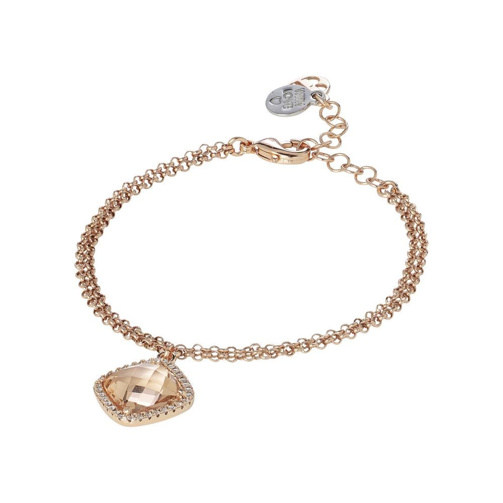 Yellow gold plated double chain bronze bracelet with sparkling cubic zirconia and a peach crystal briolette pendant for a soft modern touch. Shop premium jewelry online.