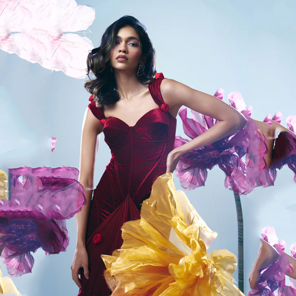 Velvet corset gown with sweetheart neck and rose straps, perfect for events. Shop online from our curated edit of premium fashion.
