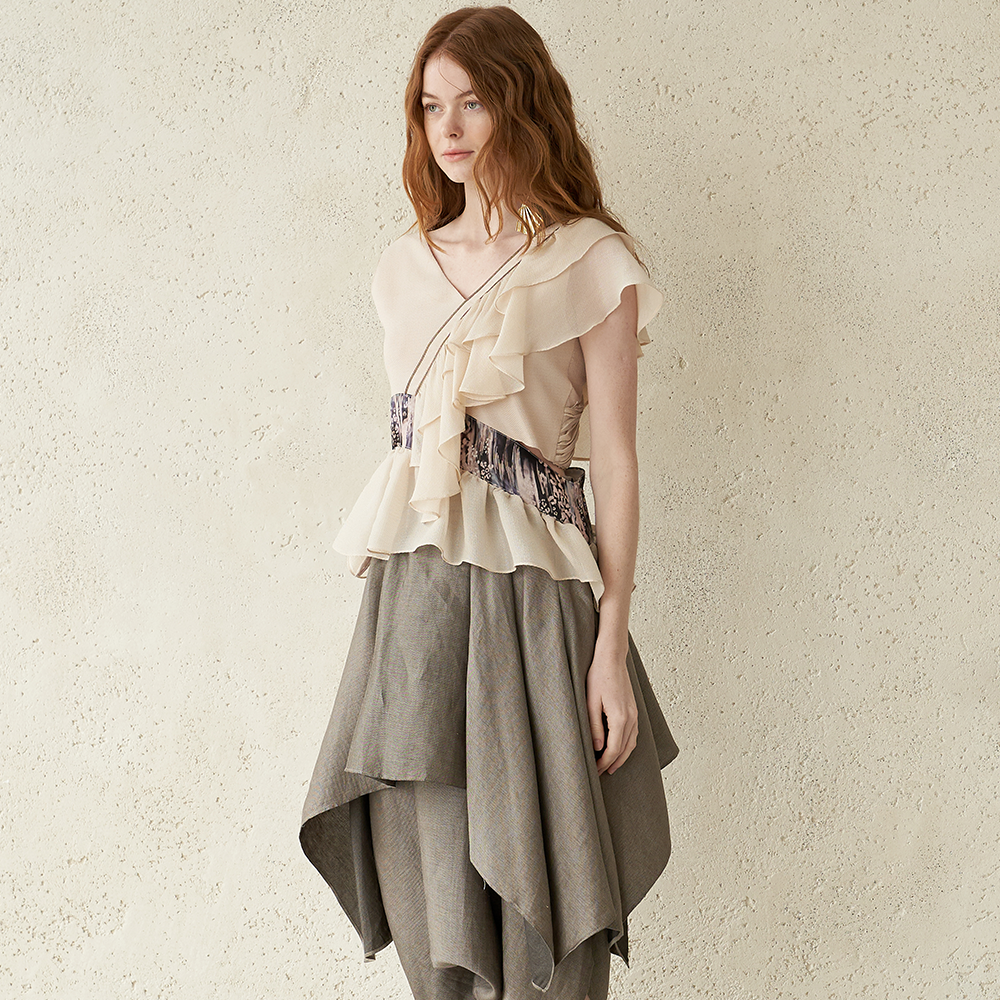 Find ruffle layered linen harem pants at the best designer clothing online. Shop Now!
