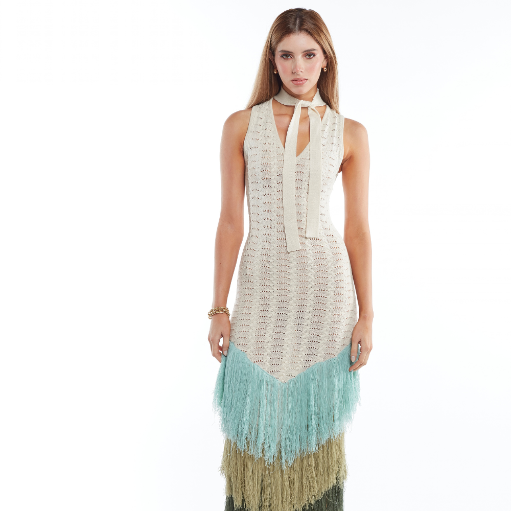 Shop the Rumi Long Sleeve Maxi Dress at TLM, featuring tie-up straps and layered fringe detailing. Explore luxury fashion on The Luxe Maison website.