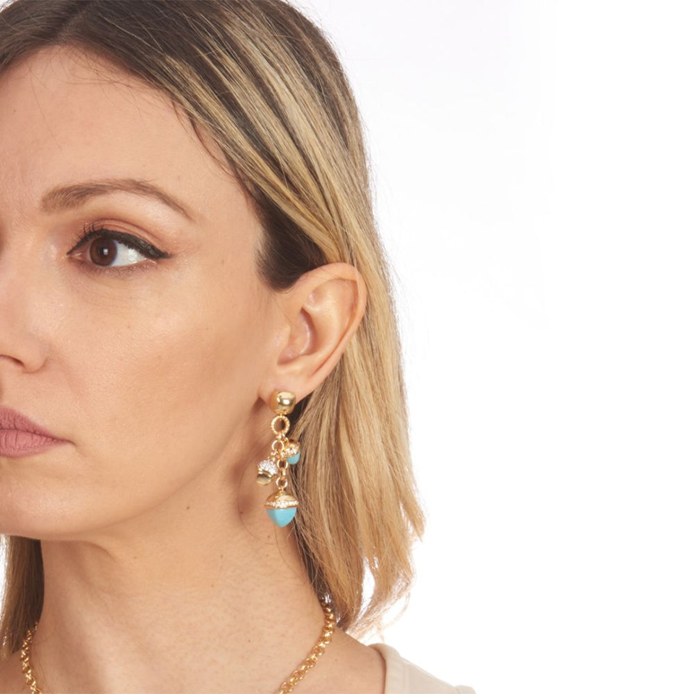 Shop online premium gold plated dangle earrings with turquoise pyramidal crystals and cubic zirconia pyramid detailing for elegant styling.