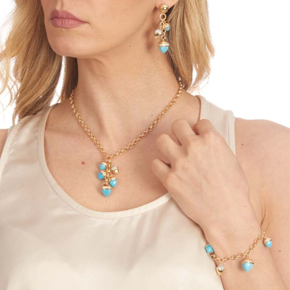 Shop online premium gold plated necklace with turquoise pyramidal crystals and sparkling cubic zirconia accents.