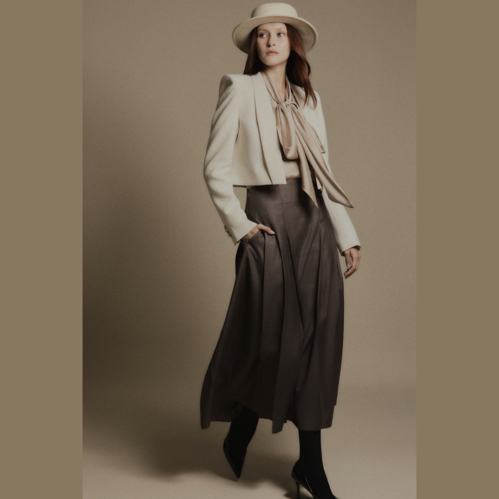 Create sophisticated looks by combining luxury dresses with the elegant Sandstone Cropped Blazer. Shop Now!