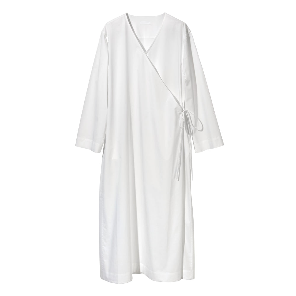 Discover the Sarita Caftan at The Luxe Maison, featuring an ankle-length wrap design, wide sleeves, adjustable side ties, and a V-neckline for effortless elegance.