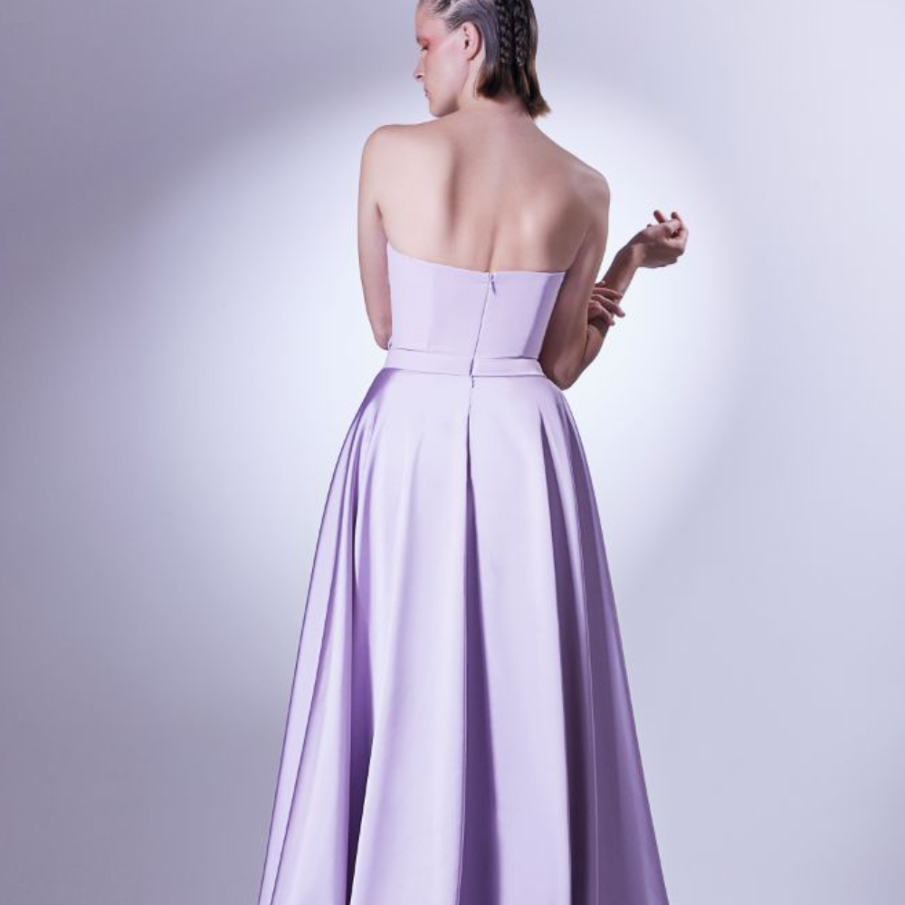 Carefully crafted in an amalgam of satin and crepe, this dress is constructed with reversing pleats at the bodice.