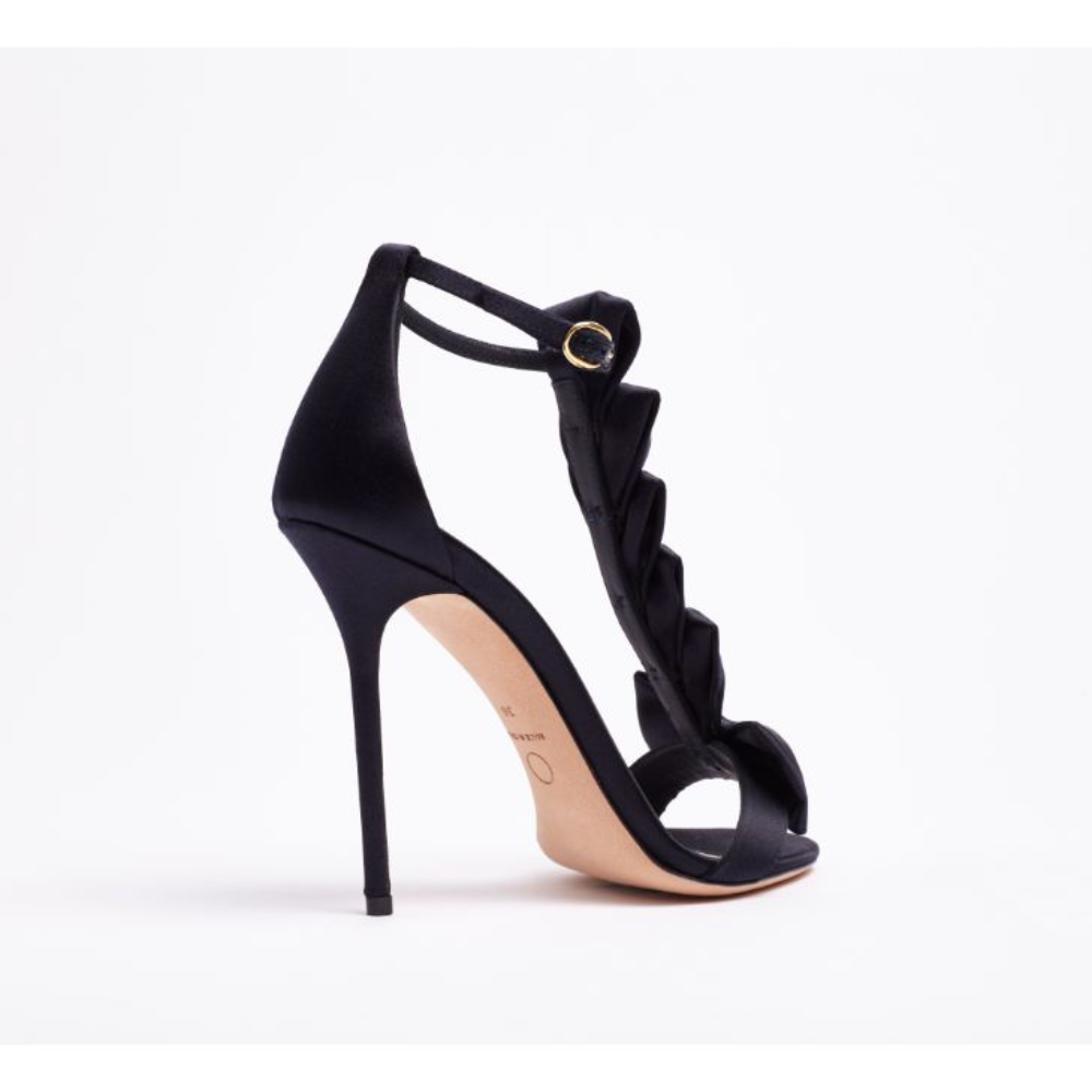  The La Sensuelle black satin sandalsfeature a tuxedo-style white-pleated T-bar front and super-high stiletto-heel.