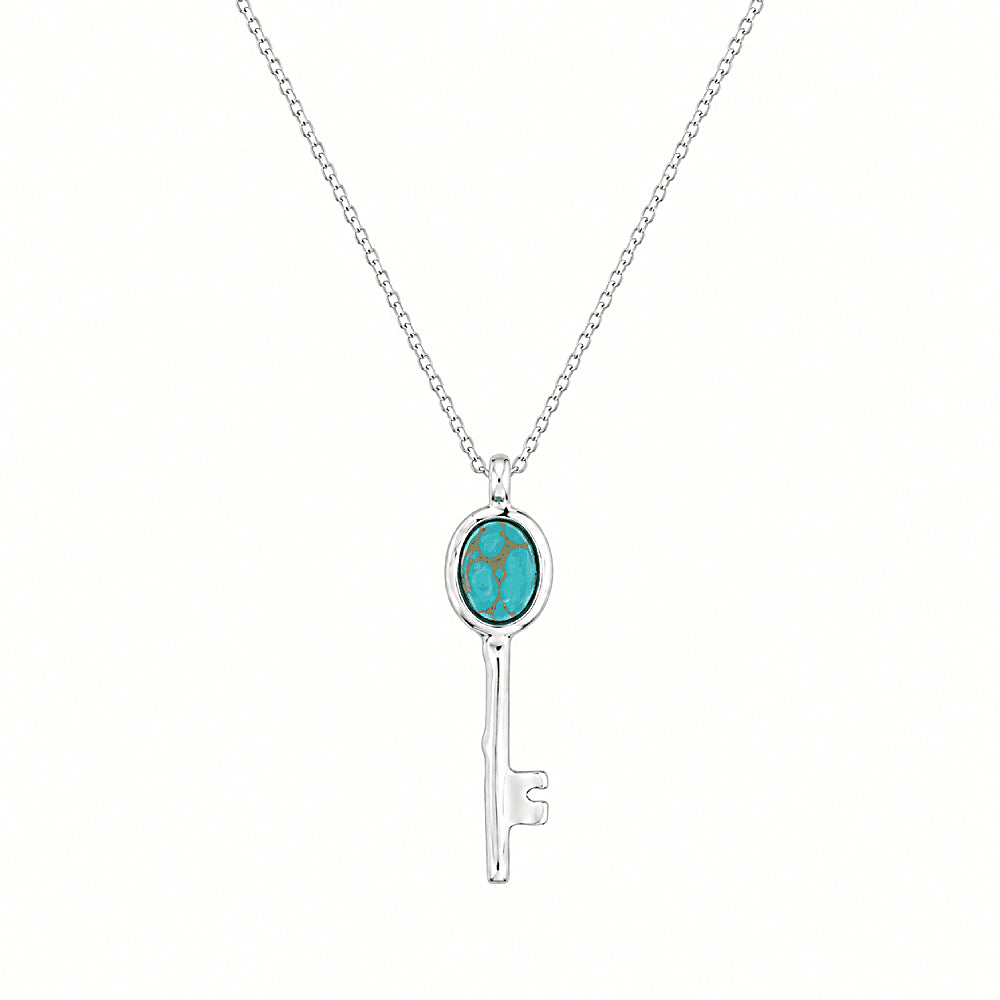 Discover the Shambhala Key Turquoise Necklace at The Luxe Maison, featuring a vibrant turquoise stone, a graceful key pendant, and a sterling silver chain for a timeless, meaningful touch.