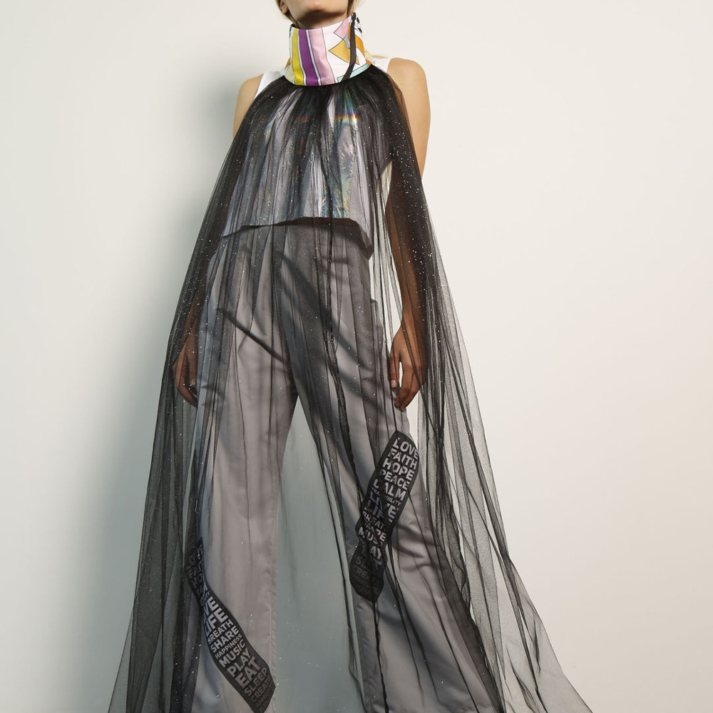 Sheer detachable tunic cape in shimmery tulle and a hand-illustrated digital print on color with concealed zipper.