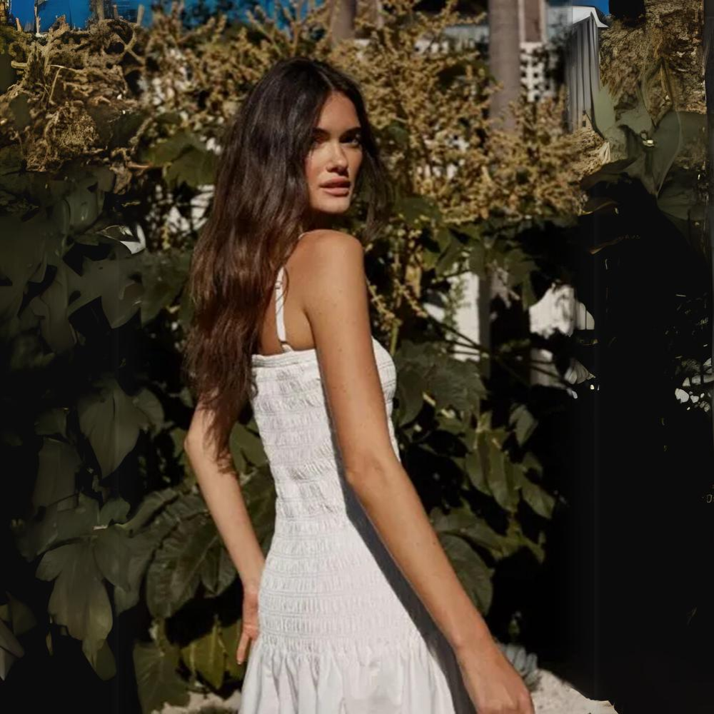 Welcome the return of summer with this white Maxi Shirred Dress. Made from 100% cotton poplin.