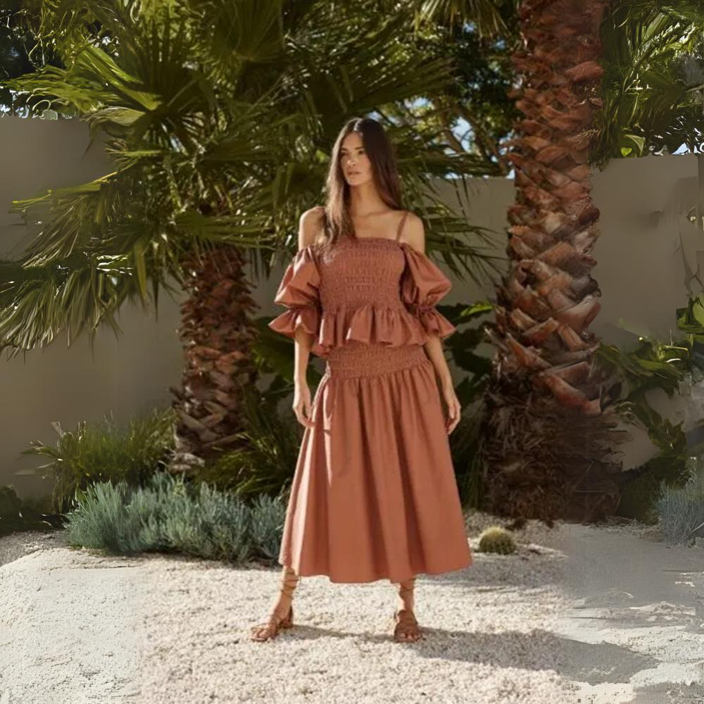 Sofia Irina's Shirred Midi Skirt imbues artisanal flair that has us longing for warmer shores. 