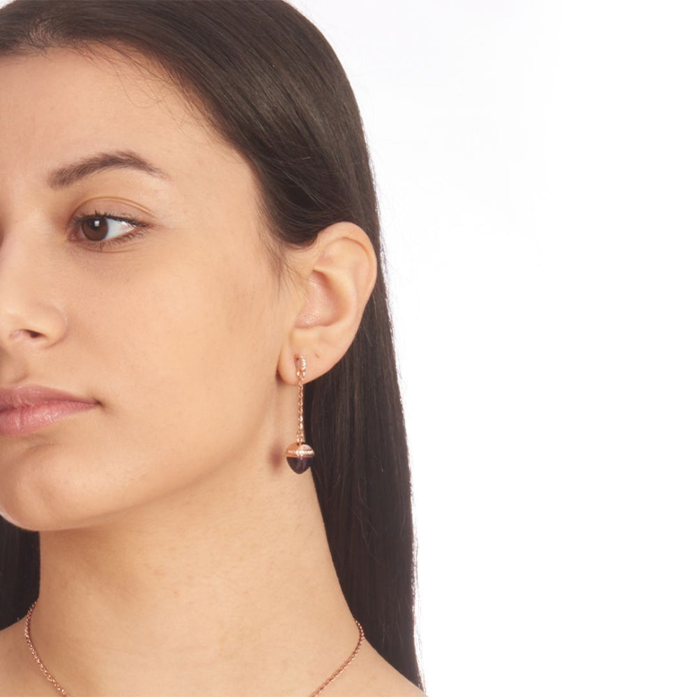 Shop online premium rose gold plated dangle earrings with amethyst pyramidal crystals and sparkling cubic zirconia accents for elegant styling.