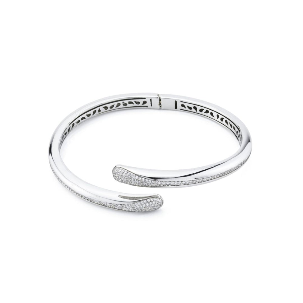 Elegant rhodium-plated bronze wrap cuff bracelet with sparkling pavé cubic zirconia stones for a modern luxe look. Shop premium jewelry online.