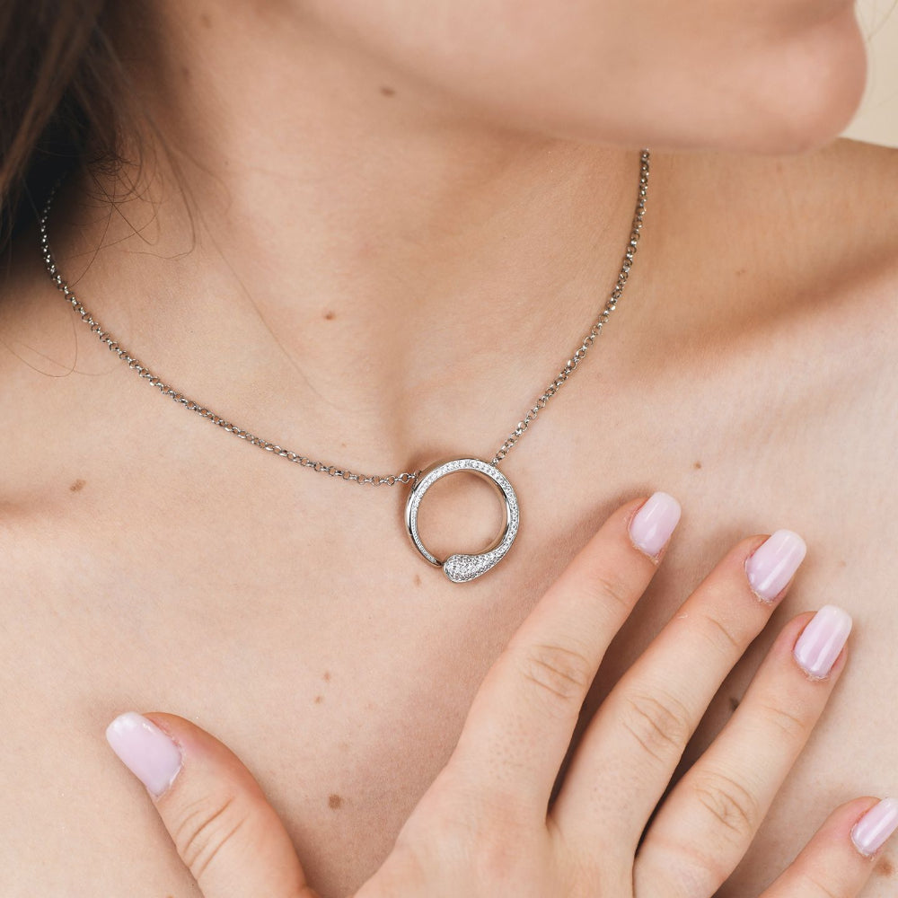 Shop online premium rhodium plated silver pendant necklace with sparkling pave cubic zirconia circle design.