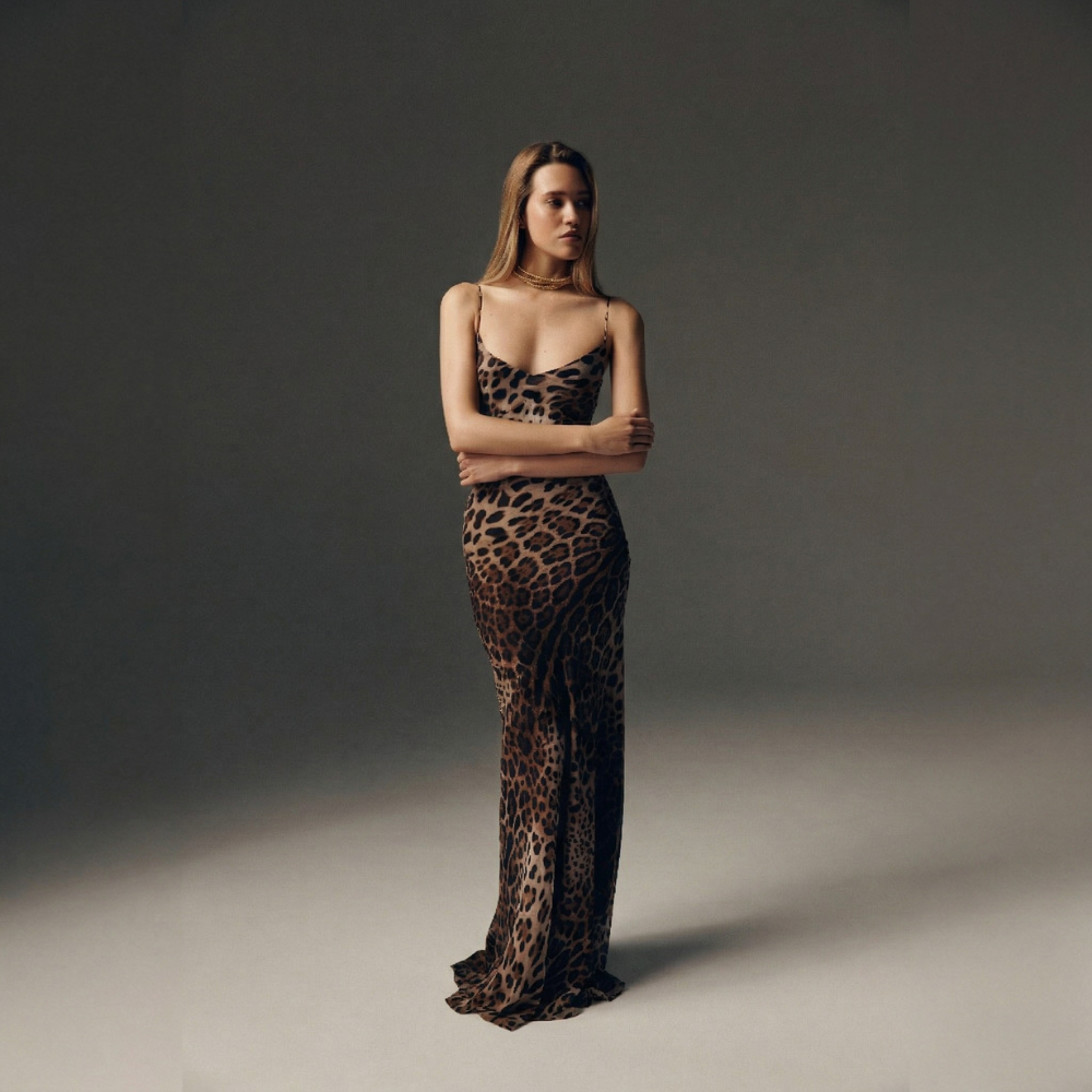 Elegant silk dress with a perfect body-hugging fit for a sleek, refined look. Shop now at our exclusive clothing website.
