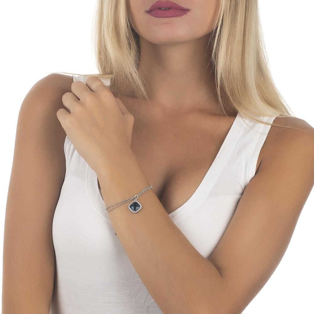 Rhodium-plated double chain bronze bracelet featuring sparkling cubic zirconia and a blue Montana crystal for a sleek contemporary finish. Shop premium jewelry online.