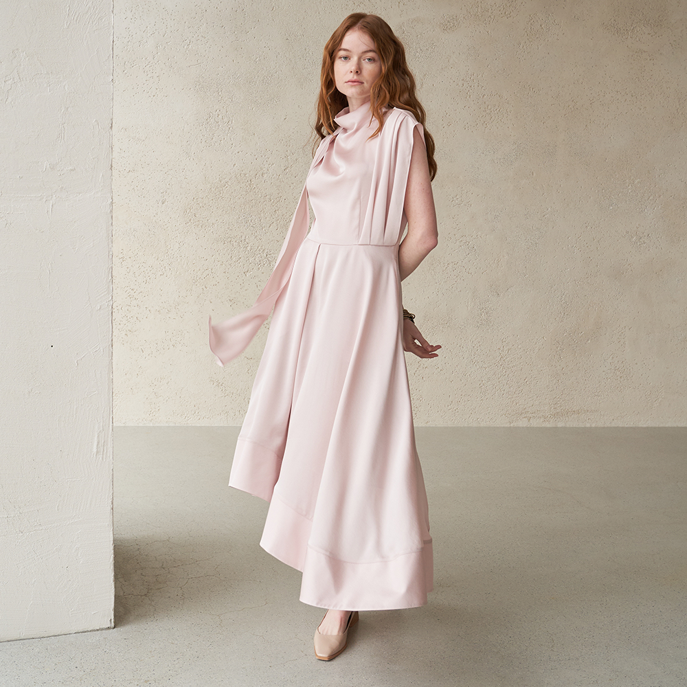 Find the perfect sleeveless slit dress in light pink at our clothing store. Shop now!