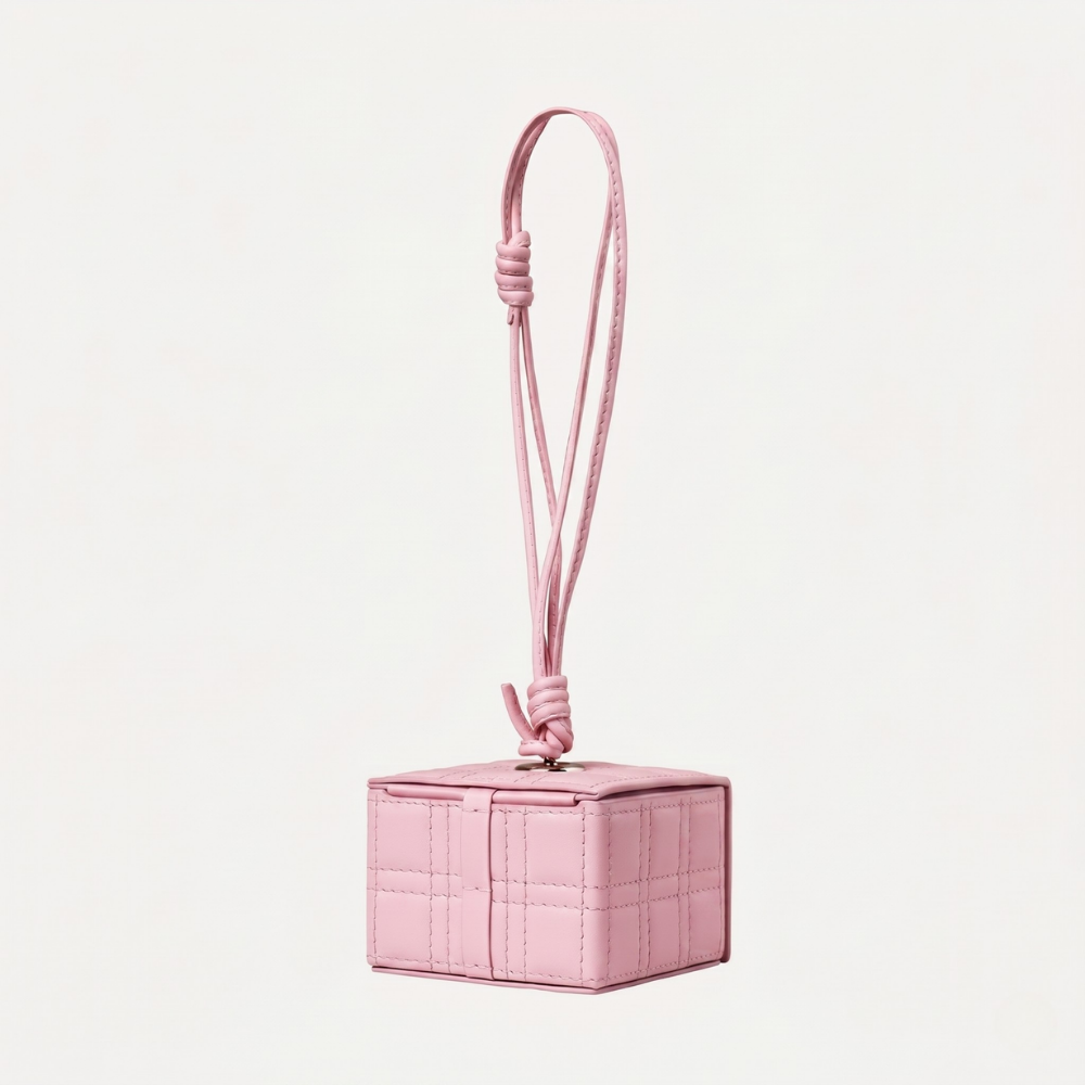 Genuine leather handbag with magnetic closure and silver hardware. Shop online from our curated edit of premium fashion.