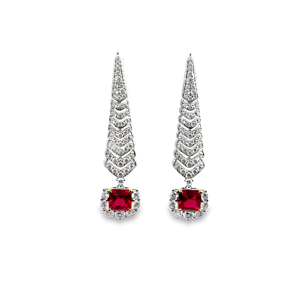 Shop online premium rhodium plated ruby shoulder duster earrings with sparkling cubic zirconia stones.