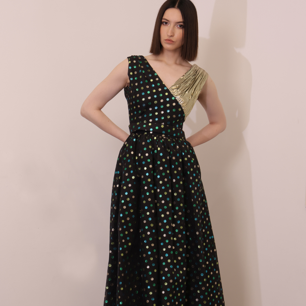 Spotted black organza dress with shiny gold shoulder
