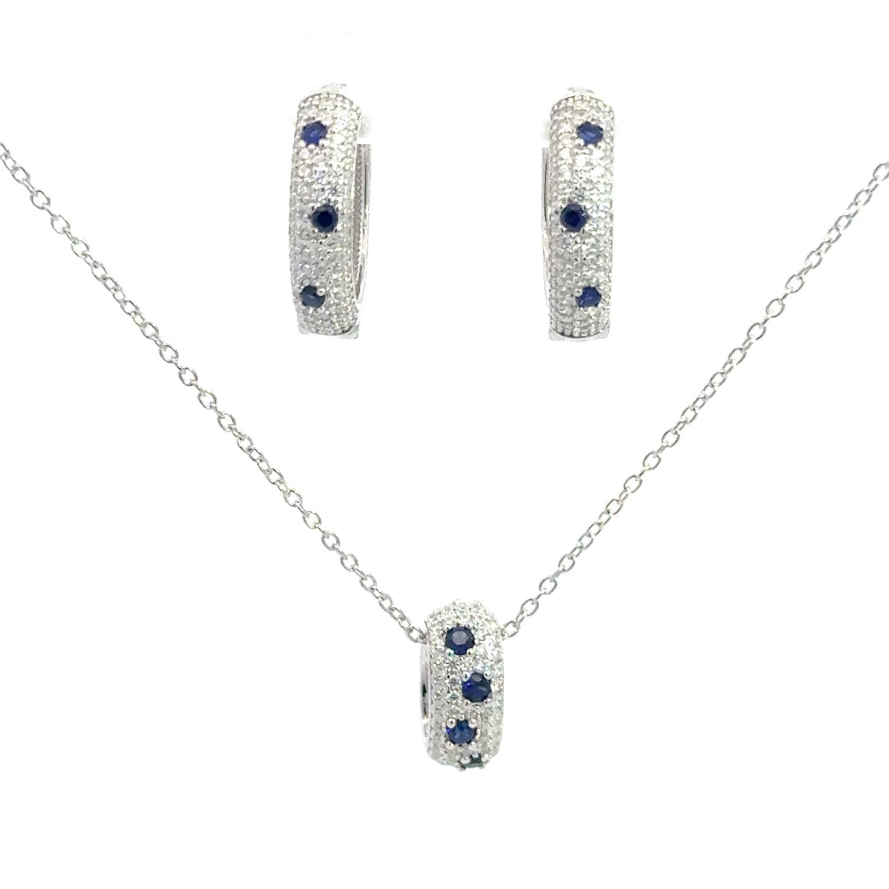 Shop sterling silver blue sapphire huggie earrings featuring lab-created blue sapphire, sparkling cubic zirconia, and an elegant oval pavé design.
