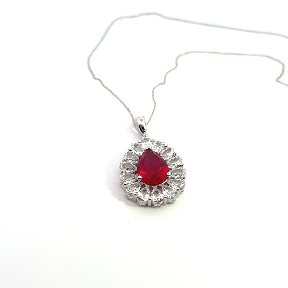 Shop online premium sterling silver tear drop ruby pendant necklace with elegant zirconia detailing.