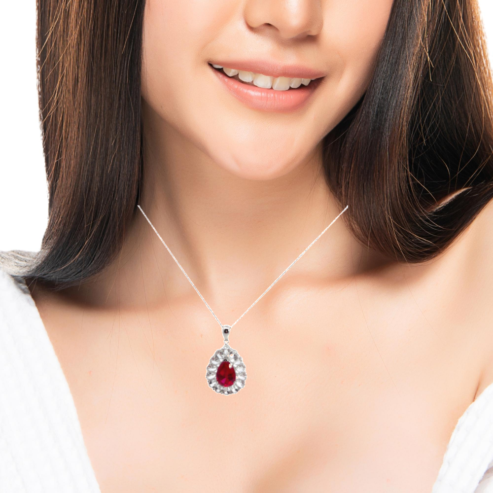 Shop online premium sterling silver tear drop ruby pendant necklace with elegant zirconia detailing.