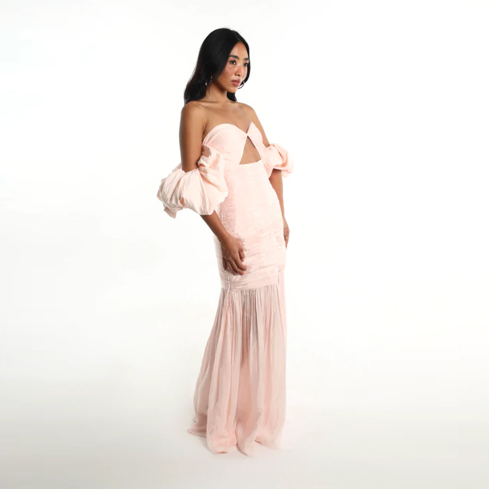 Blush off shoulder dress with puff sleeves and breezy skirt, perfect for parties. Shop online from our curated edit of premium fashion.